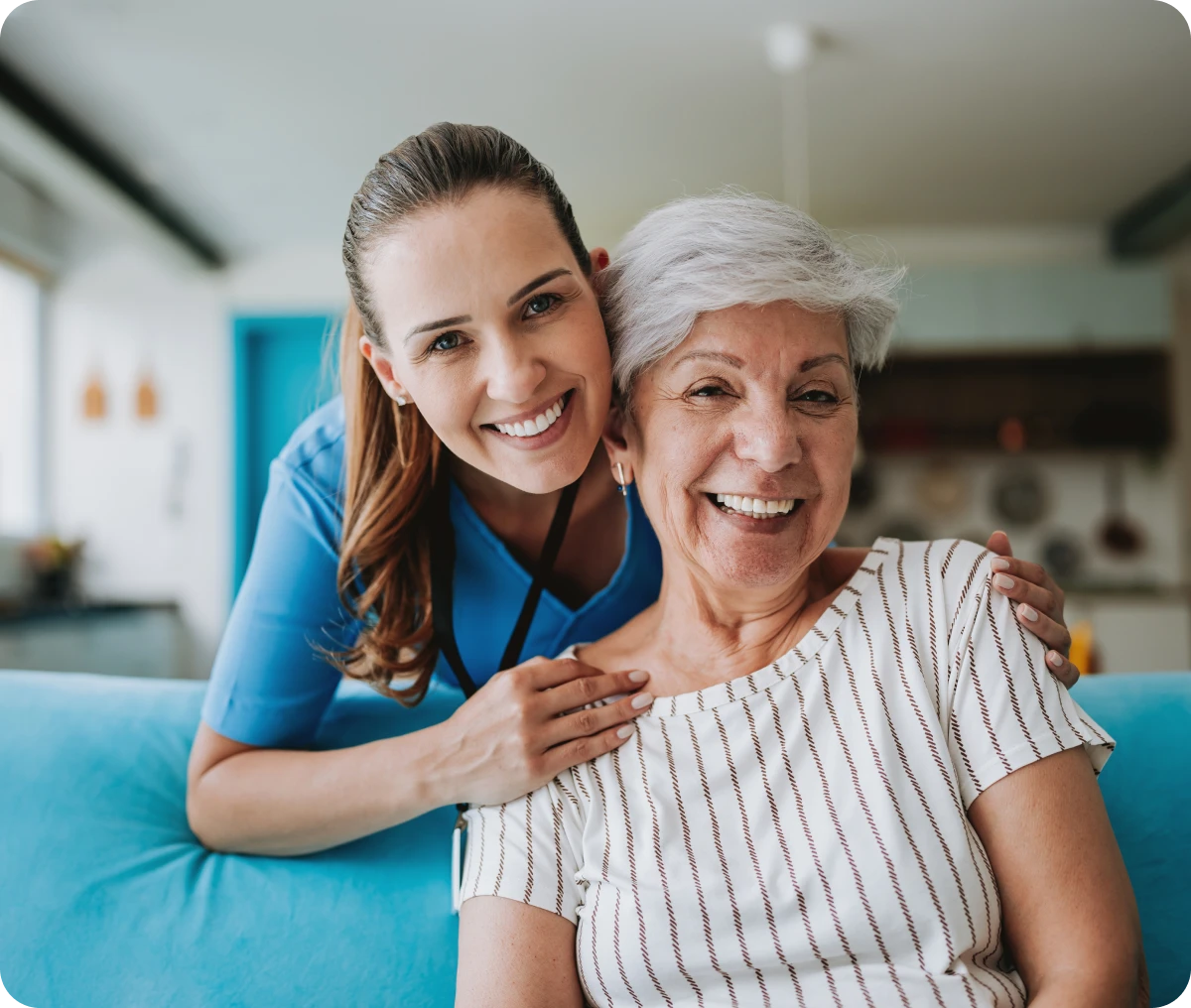 Nurse with happy senior woman